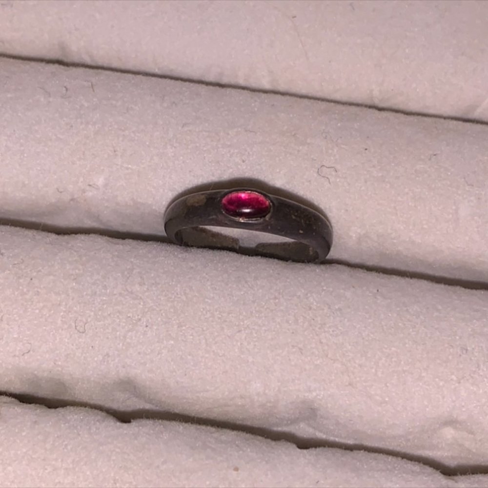 red and silver ring